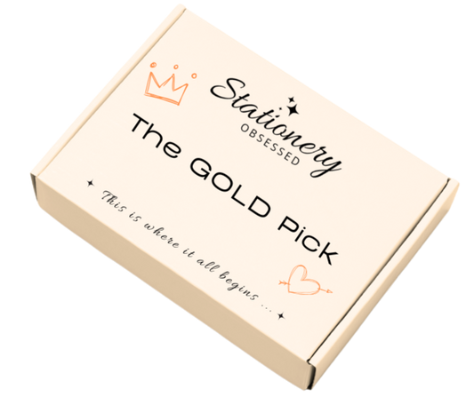Cardboard box with 'Stationery Obsessed' branding on a white background